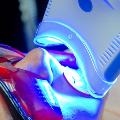 Patient in Columbus getting teeth whitening treatment