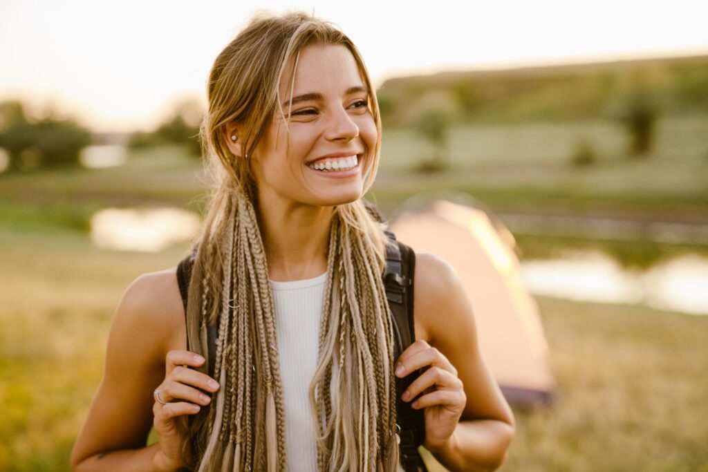 Woman smiling while hiking